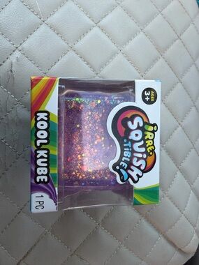 Ja-Ru Iridescent Purple Glitter Squishy Kool Kube